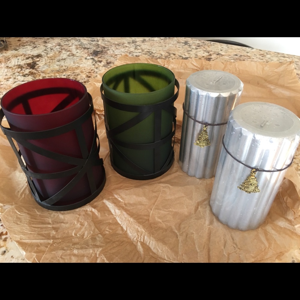 Metal hurricane Candle holders with two candles.